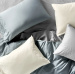 coyuchi-relax-sateen-color-pillows-bed